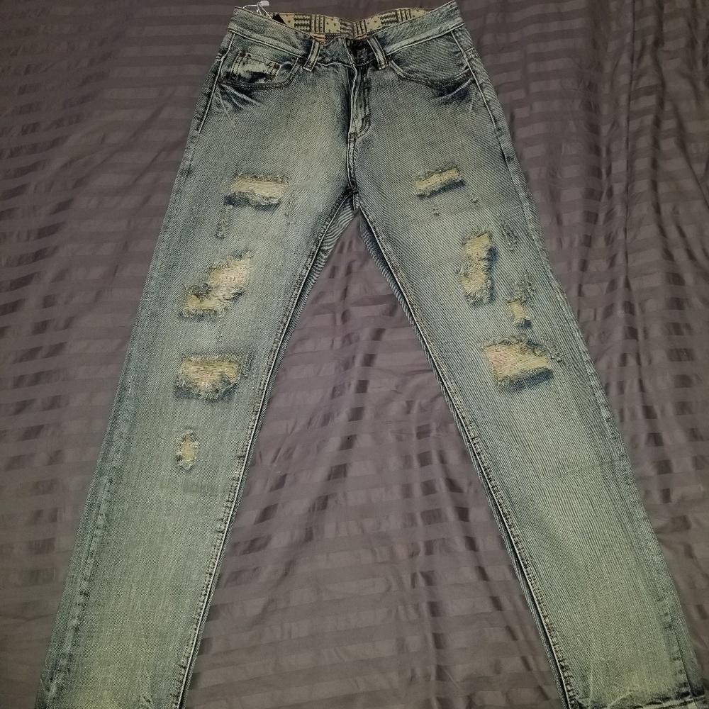 Distressed denim jeans